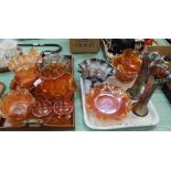 Various Carnival glass in orange and mauve lustre (two trays)