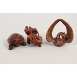 Three carved hardwood netsukes of a tortoise,