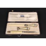 An unusual continental silver and enamel desk set consisting of dip pen, seal and letter opener,