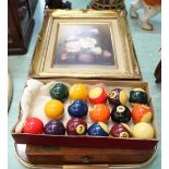 A pair of still life oils on canvas plus two sets of snooker and pool balls