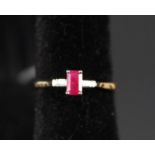 An 18ct gold diamond and ruby ring,