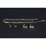 A 9ct gold wavy link chain and two pairs of 9ct gold earrings,