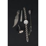 Mixed silver and white metal items including a perfume funnel, lady's wristwatch, tie clip,