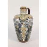 A Royal Doulton stoneware leaf and floral decorated bottle