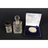 A silver and tortoiseshell lidded scent bottle,
