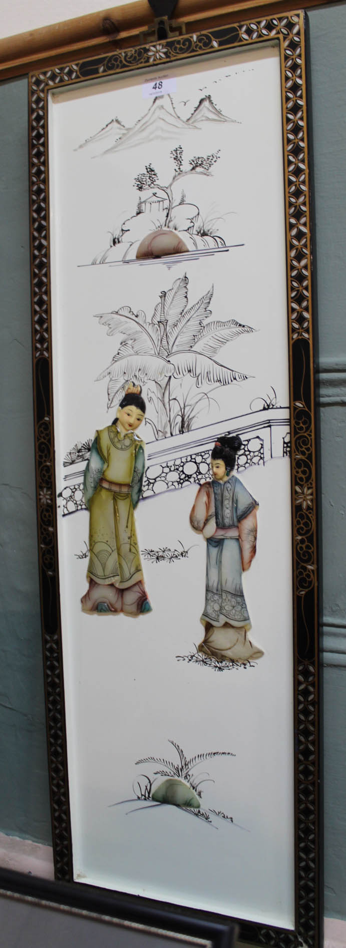 A Japanese lacquer plaque with hardstone figure decoration,