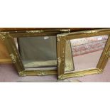 A pair of gilt wall mirrors,