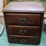 A Victorian miniature mahogany three drawer chest
