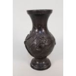 A 19th Century Chinese bronze vase with bird and branch decoration,