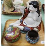 A Chinese porcelain seated Buddha,