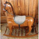 A hardwood decorative rocking horse