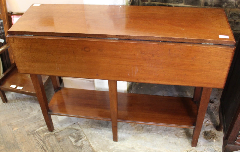 A 19th Century mahogany flap leaf hall table with under tier