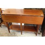 A 19th Century mahogany flap leaf hall table with under tier