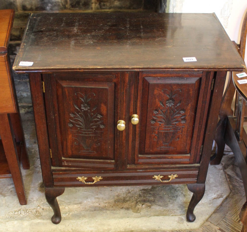 An Edwardian mahogany two door,