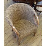 A modern wicker and wood conservatory chair