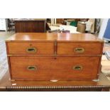 A three drawer top half of a mahogany brass bound military chest