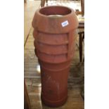 A large terracotta chimney pot