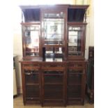 A substantial Edwardian rosewood two part glazed cabinet