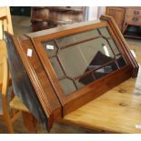 A reproduction mahogany astragal glazed hanging corner cabinet with shaped shelved top