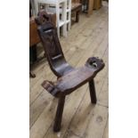 An Arts and Crafts style three legged spinning chair which can be dismantled