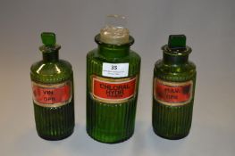 Three Green Glass Chemist Bottles