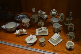 Collection of Twenty One Crested Ware Mugs and Dis
