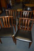 Set of Four Teak Slatback Dining Chairs with Black
