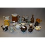 Collection of Seventeen Jugs and a Money Bank