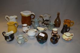 Collection of Seventeen Jugs and a Money Bank