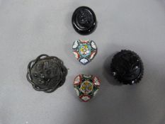 Three Whitby Jet Brooches and Two Italian Mosaic B