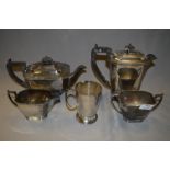 Four Piece Silver Plated Tea Set and a Mug