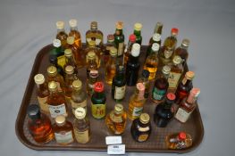 Approximately 41 Miniature Whiskey Bottles