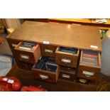 Fifteen Drawer Cabinet and Contents of Glass Lante