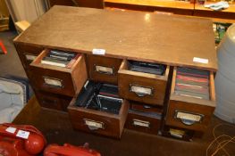 Fifteen Drawer Cabinet and Contents of Glass Lante