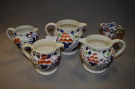 Four Imari Pattern Jugs and a Masons Jug