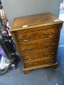 Walnut Veneered and Inlaid Four Height Chest of Dr