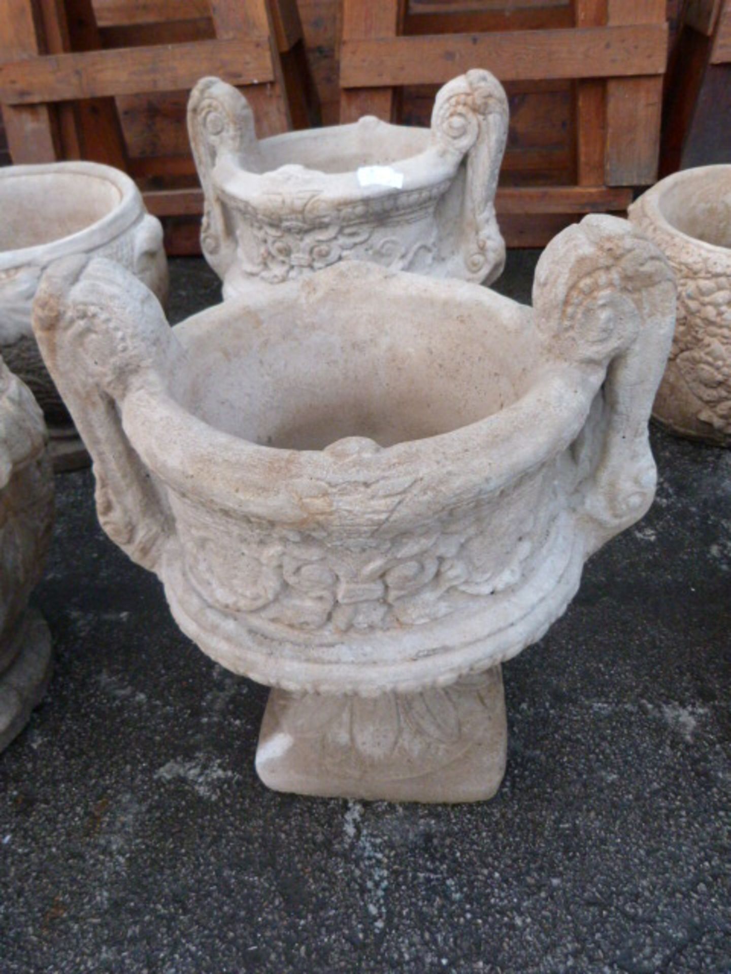 Pair of Reconstituted Limestone Garden Urns on Pli