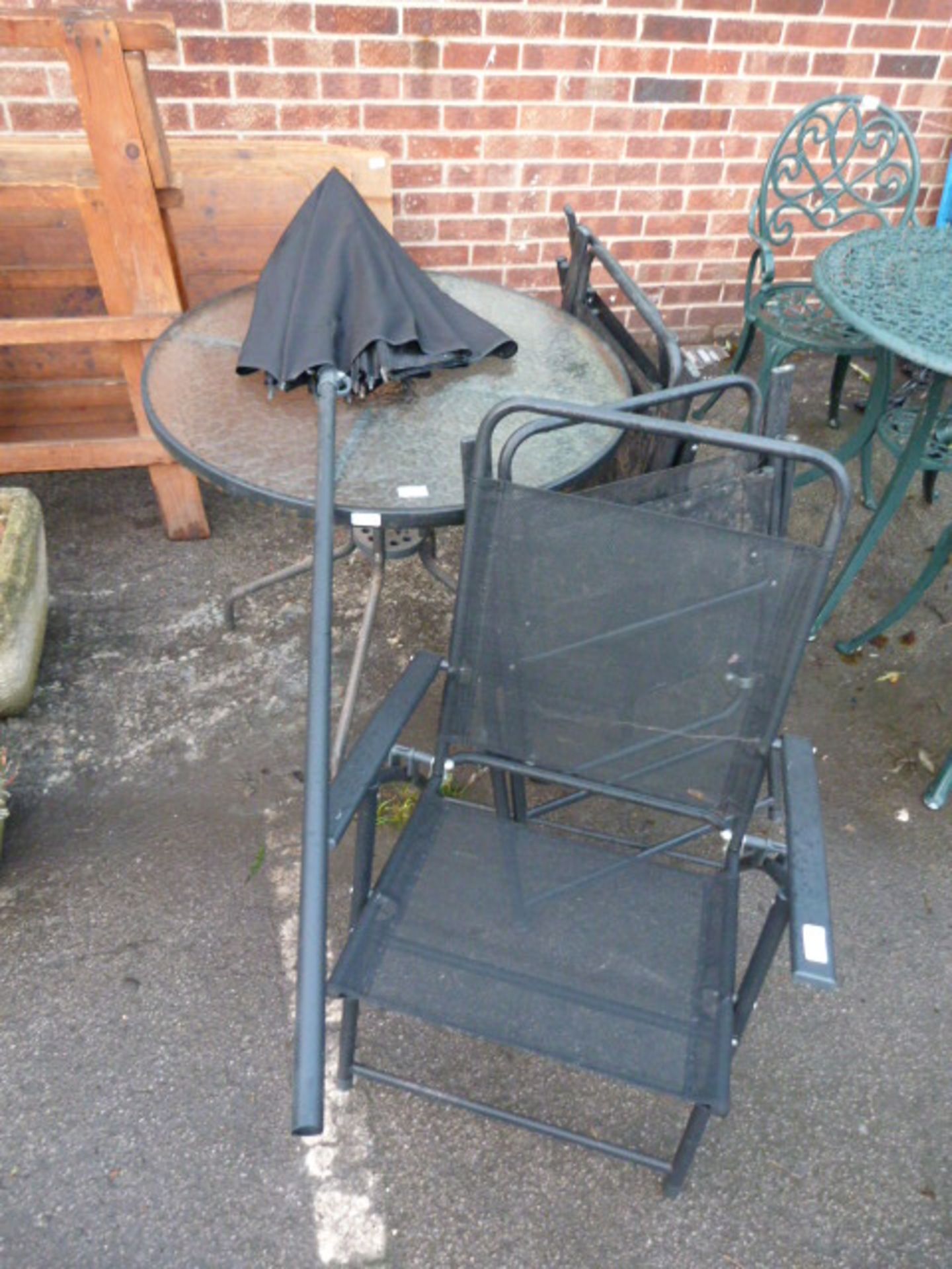 Black Tubular Metal and Glass Topped Garden Table