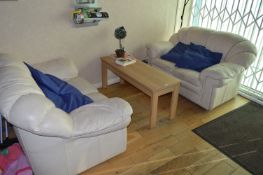Two Cream 2 Seat Sofas and a Light Oak Reception Table