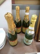 Three Bottles of Brut Andre Champagne and One Bott