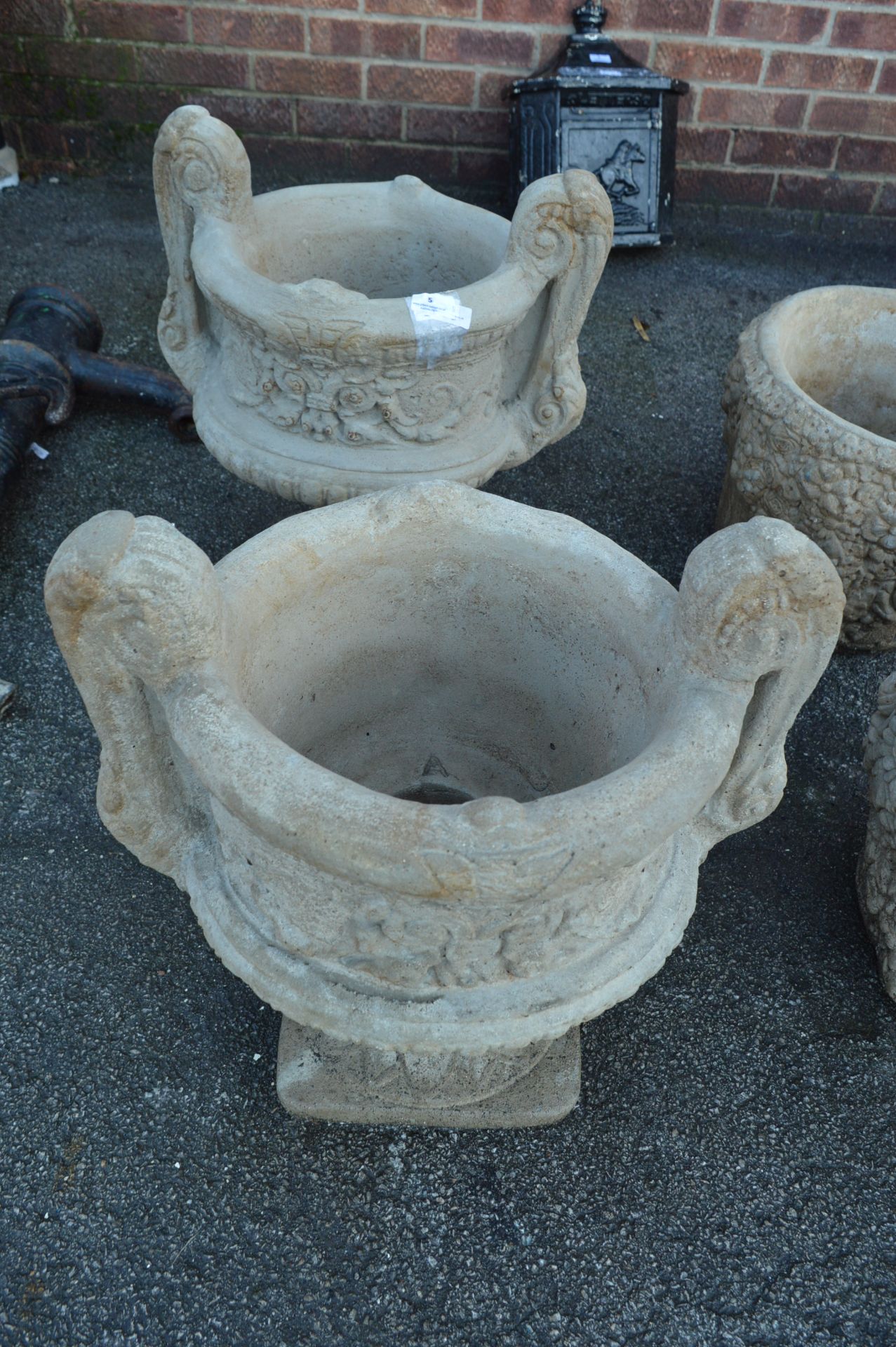 Pair of Garden Urns on Plinths