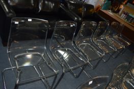 Six Perspex Chairs with Chrome Legs