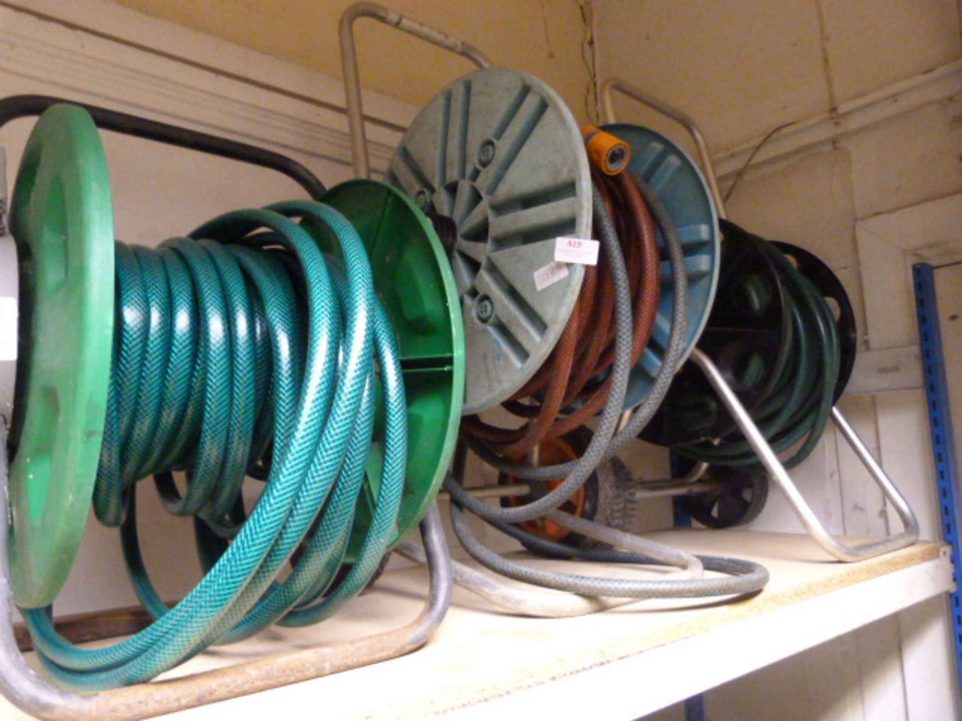 Three Hose Pipes on Reels