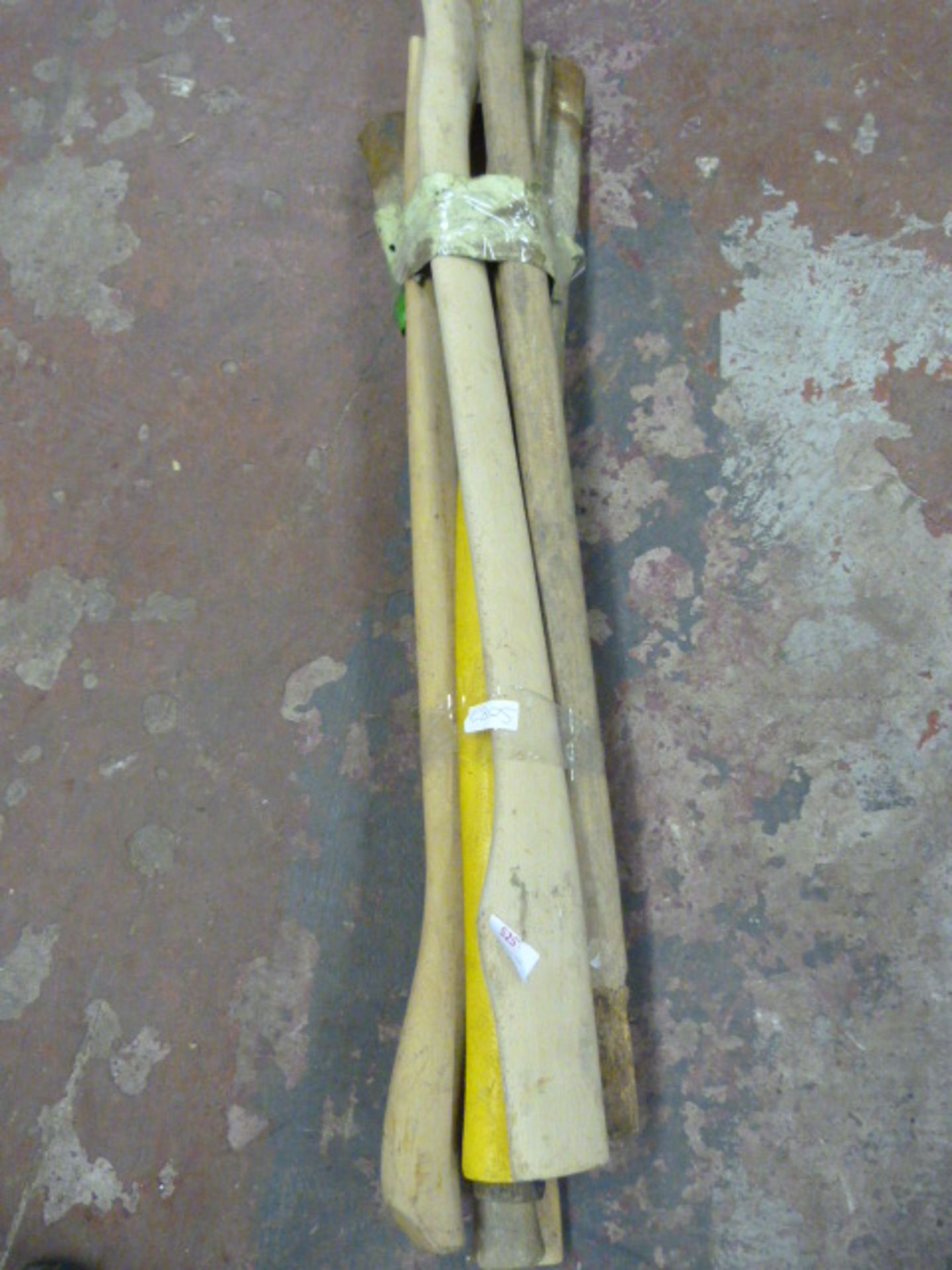 Bundle of Tools; Pickaxe and Felling Axe Shafts