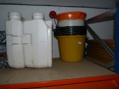 Plastic Buckets and a Porta-Potty