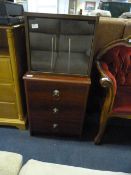 Chest of Three Drawers in Mahogany Finish and a Re