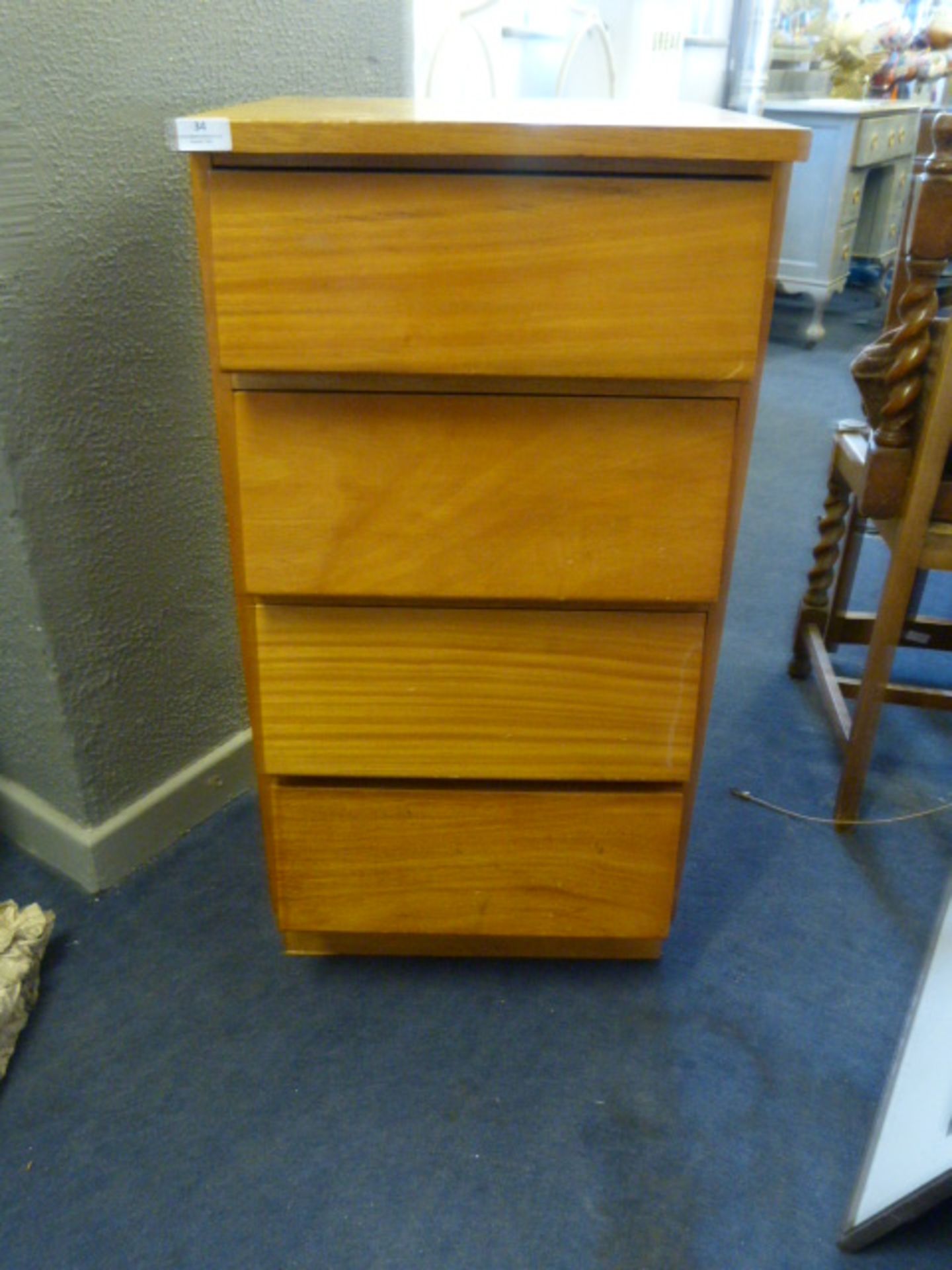 Teak Chest of Four Drawers Containing Assorted Han