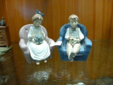 Pair of Nao Figurines - Boy & Girl with Presents