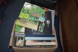 Box of LP Records and Cassettes