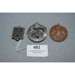 Two Medallions and a Silver Brooch